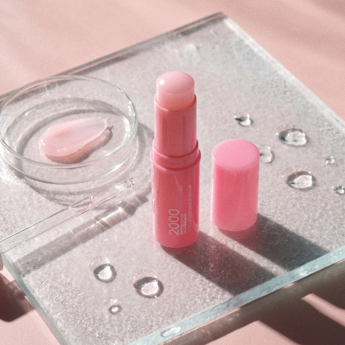 prettycoded balm stick in sunlight on glass